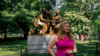 Kathryn Garcia in front of the statue of famed suffragists Sojourner Truth, Susan B. Anthony and Elizabeth Cady Stanton